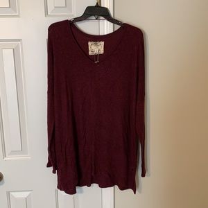 Knee-length long sleeved burgundy sweater